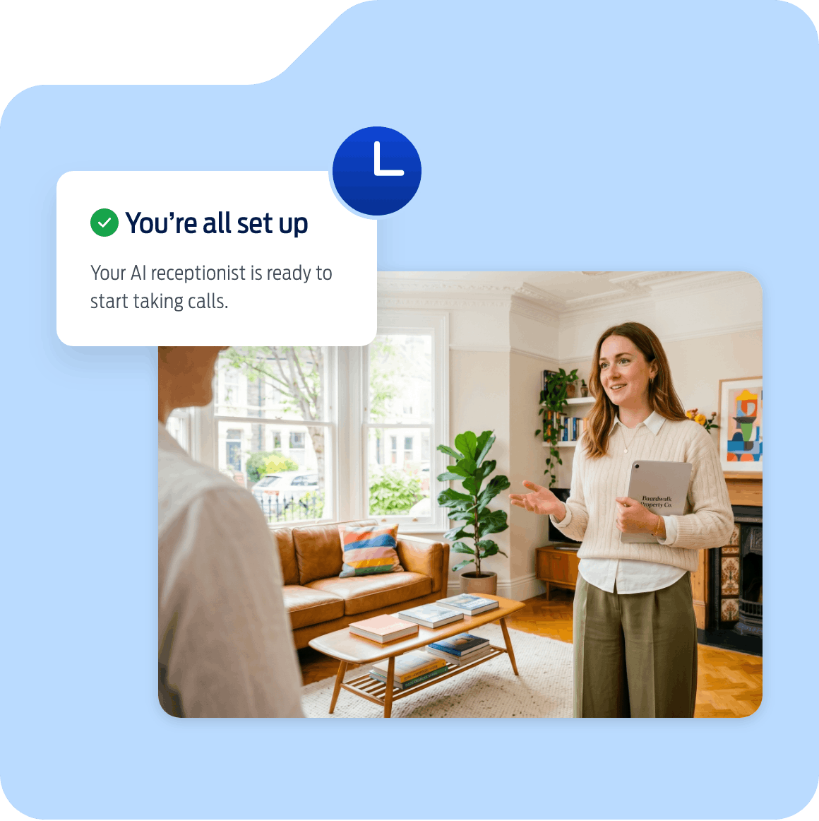 An estate agent showing a client around a house, while the AI Receptionist handles incoming calls